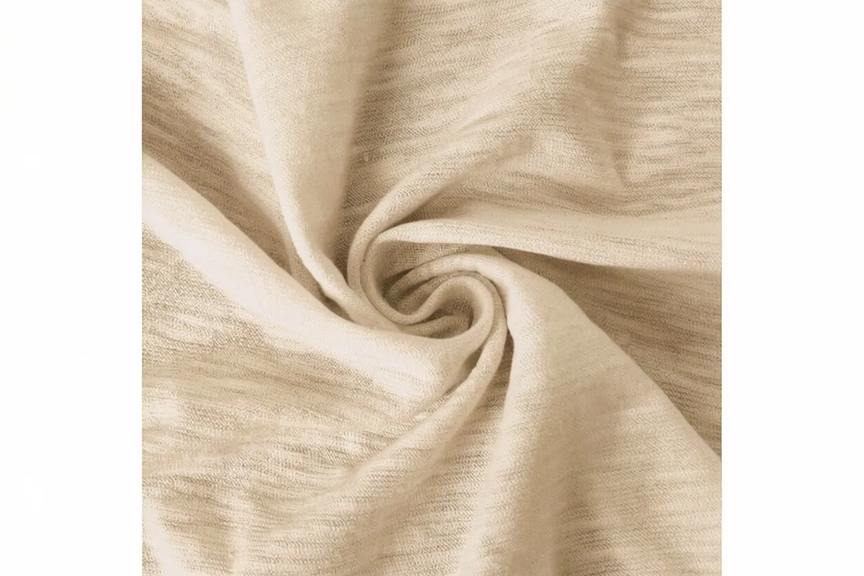 Slub jersey knit fabric in warm cream cotton with organic textured surface, manufactured at Apex Corporation knitwear factory in Karachi Pakistan